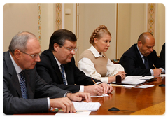 Vladimir Putin and Yulia Tymoshenko’s expanded governmental negotiations