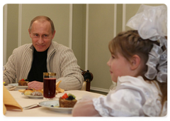 Prime Minister Vladimir Putin met with little Buryat girl Dasha Varfolomeyeva, her sister and mother