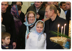 Vladimir Putin has attended Christmas Mass at the Purification of Virgin Mary Church in Petrozavodsk