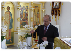 Prime Minister Vladimir Putin at the consecration of the restored Assumption of the Holy Virgin Church in the Russian Embassy compound in China