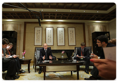 Prime Minister Vladimir Putin answering questions from the media, concluding his official visit to the People's Republic of China