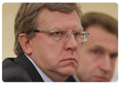 Deputy Prime Minister and Minister of Finance Alexei Kudrin, left, and First Deputy Prime Minister Igor Shuvalov at the Government Presidium meeting