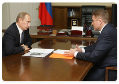 Prime Minister Vladimir Putin with Kaliningrad Region Governor Georgy Boos