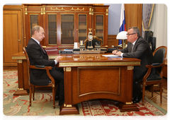 Prime Minister Vladimir Putin during a meeting with Andrei Kostin, President of Vneshtorgbank