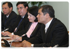 Ecuadorian President Rafael Correa in a meeting with Vladimir Putin