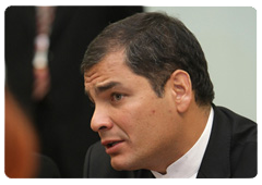 Ecuadorian President Rafael Correa in a meeting with Vladimir Putin