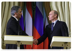 Prime Minister Vladimir Putin and Federal Chancellor Werner Faymann at a joint press conference following bilateral talks