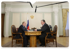 Prime Minister Vladimir Putin meeting with the Head of the Federal Customs Service, Andrei Belyaninov