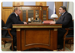 Prime Minister Vladimir Putin with Igor Artemyev, head of the Federal Antimonopoly Service of Russia