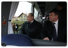 Prime Minister Vladimir Putin visiting low-rise Novaya Izhora development, built for military servicemen