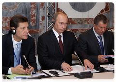 Russian Prime Minister Vladimir Putin at the 14th meeting of the Russian-French Commission on Bilateral Cooperation held at the level of prime ministers. Deputy Prime Minister Alexander Zhukov (left) and Deputy Prime Minister Igor Sechin (right)