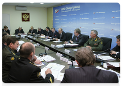 Prime Minister Vladimir Putin chairing a meeting on defence industry issues at the Energomash Research Labs in Khimki