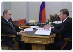 Prime Minister Vladimir Putin during a meeting with Deputy Prime Minister Sergei Ivanov