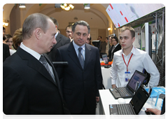 Prime Minister Vladimir Putin visiting an exhibition of finalists in the innovative projects competition organised by the National Youth Innovation Convention
