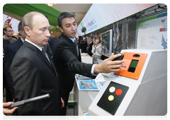 Prime Minister Vladimir Putin visiting an exhibition of finalists in the innovative projects competition organised by the National Youth Innovation Convention