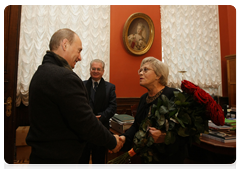 Prime Minister Vladimir Putin congratulating Actress Alisa Freindlich and Director of the State Hermitage Museum, Mikhail Piotrovsky on their respective birthdays