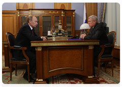 Prime Minister Vladimir Putin meets with Head of the Federal Space Agency Anatoly Perminov