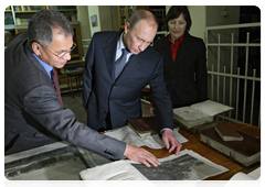 Prime Minister Vladimir Putin at the headquarters of the Russian Geographic Society in St Petersburg