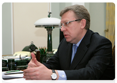 Deputy Prime Minister and Finance Minister Alexei Kudrin during a meeting with Prime Minister Vladimir Putin