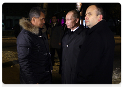 Prime Minister Vladimir Putin,  in Perm on a working trip, laying flowers outside the night club where a tragedy occurred on December 5
