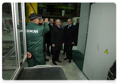 Prime Minister Vladimir Putin visiting the Urals Railway Engineering Plant during his trip to the Urals