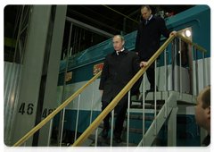 Prime Minister Vladimir Putin visiting the Urals Railway Engineering Plant during his trip to the Urals