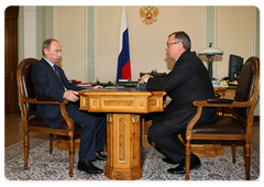 Prime Minister Vladimir Putin during a working meeting with VTB Bank Chairman Andrei Kostin
