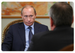 Prime Minister Vladimir Putin during a working meeting with VTB Bank Chairman Andrei Kostin