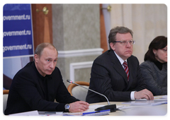Prime Minister Vladimir Putin conducting a meeting to discuss the conditions and problems associated with oil industry development