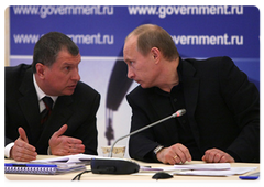 Prime Minister Vladimir Putin conducting a meeting to discuss the conditions and problems associated with oil industry development