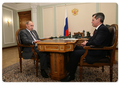 Prime Minister Vladimir Putin during a meeting with Governor of the Astrakhan Region Alexander Zhilkin