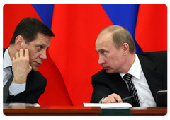 Deputy Prime Minister Alexander Zhukov and Prime Minister Vladimir Putin at a meeting of the Presidential Council on Physical Fitness and Sports, Sports Records, and Preparations for the 2014 Winter Olympics and Paralympics in Sochi