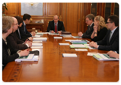 Prime Minister Vladimir Putin holding a meeting on economic issues