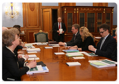 Prime Minister Vladimir Putin holding a meeting on economic issues