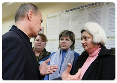 Prime Minister Vladimir Putin among staff members and job-seekers at the Podolsk Employment Centre