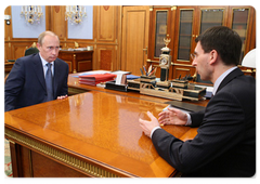 Prime Minister Vladimir Putin meeting with Telecommunications and Mass Communications Minister Igor Shchegolev