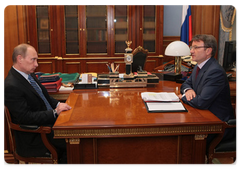 Prime Minister Vladimir Putin meeting with Sberbank President and Chairman of the Board German Gref
