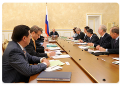 Vladimir Putin conducting a meeting on economic issues