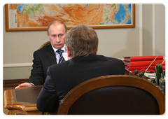 Vladimir Putin at the working meeting with Deputy Prime Minister and Minister of Finance Alexey Kudrin
