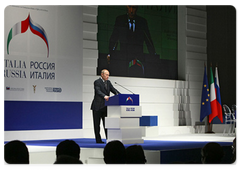 Vladimir Putin speaking at a plenary meeting of the Russian-Italian Economic Forum