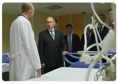 Prime Minister Vladimir Putin visiting the federally funded Cardiac Surgery Centre, opened in Astrakhan several weeks ago