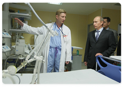 Prime Minister Vladimir Putin visiting the federally funded Cardiac Surgery Centre, opened in Astrakhan several weeks ago