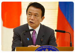 Prime Minister of Japan Taro Aso at a joint press conference with Prime Minister Vladimir Putin