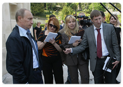 Prime Minister Vladimir Putin showing journalists the new Niva car he bought about a month ago