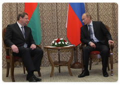 Prime Minister Vladimir Putin meeting with his Belarusian counterpart, Sergei Sidorsky, in Astana