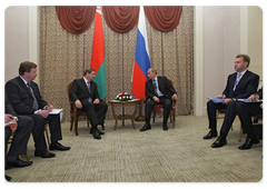 Prime Minister Vladimir Putin meeting with his Belarusian counterpart, Sergei Sidorsky, in Astana