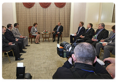 Prime Minister Vladimir Putin during a meeting with Acting Prime Minister of Moldova Zinaida Greceanii in Astana