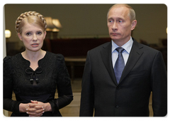Russian Prime Minister Vladimir Putin and Ukrainian Prime Minister Yulia Tymoshenko giving statements to the press following their meeting in Astana