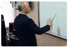 Prime Minister Vladimir Putin visiting the girls’ boarding school under the Ministry of Defence.