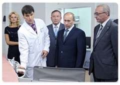 Prime Minister Vladimir Putin visiting the medical facilities in the Altai Territory